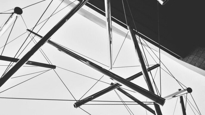 black metal frame in grayscale photography