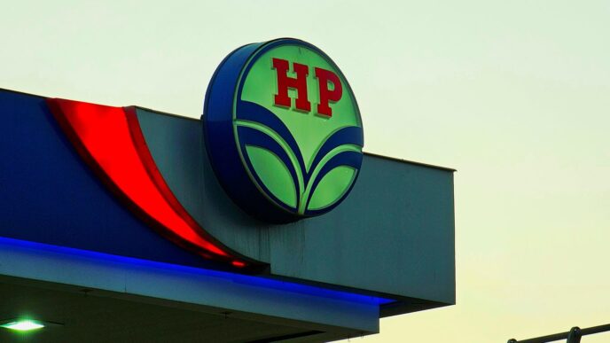 a sign for a gas station with a red, white, and blue sign