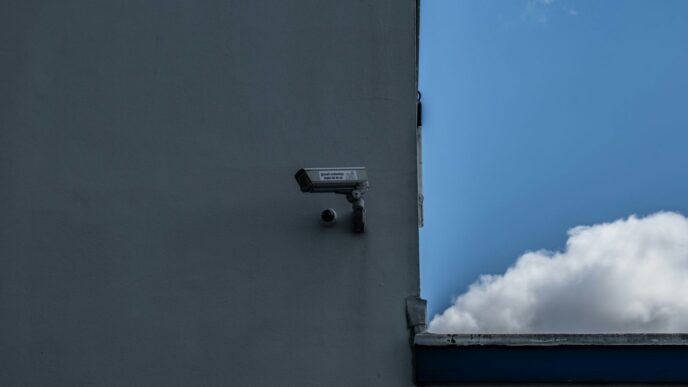 gray outdoor security camera of building