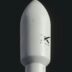 a close up of a white rocket on a black background
