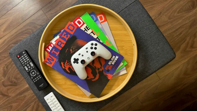a remote control sitting on top of a wooden table