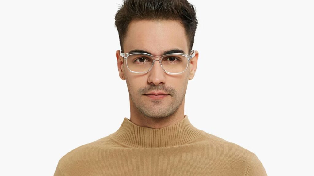 A man wearing glasses and a turtle neck sweater
