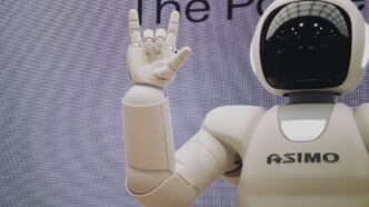 Asimo robot doing handsign