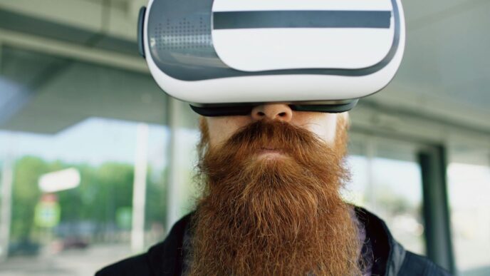 Man with long beard wearing virtual reality headset
