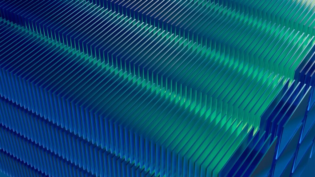 a close up of a blue and green wall