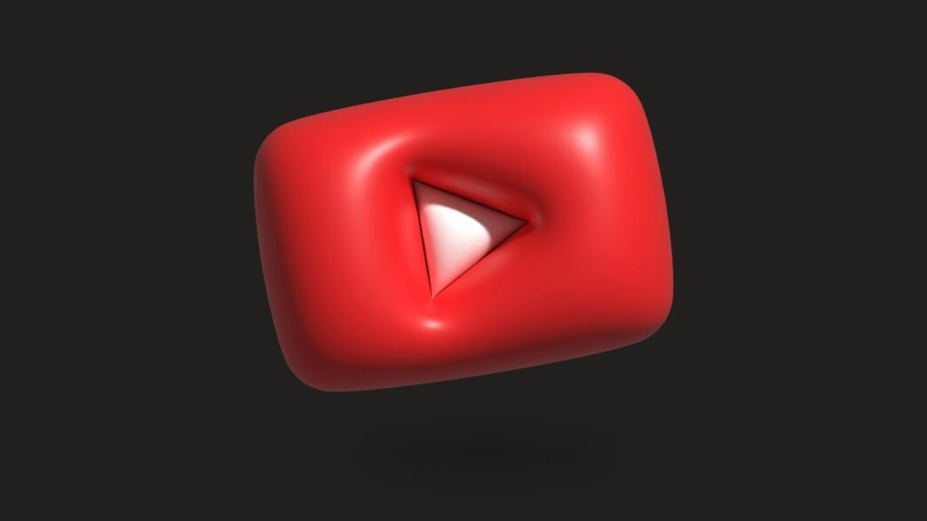 a red object with a white triangle on it