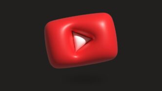 a red object with a white triangle on it