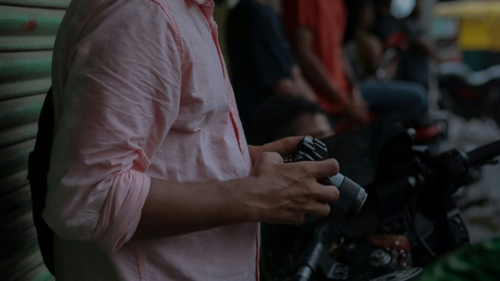 a man holding a watch