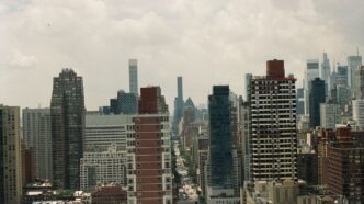 a view of a city with tall buildings