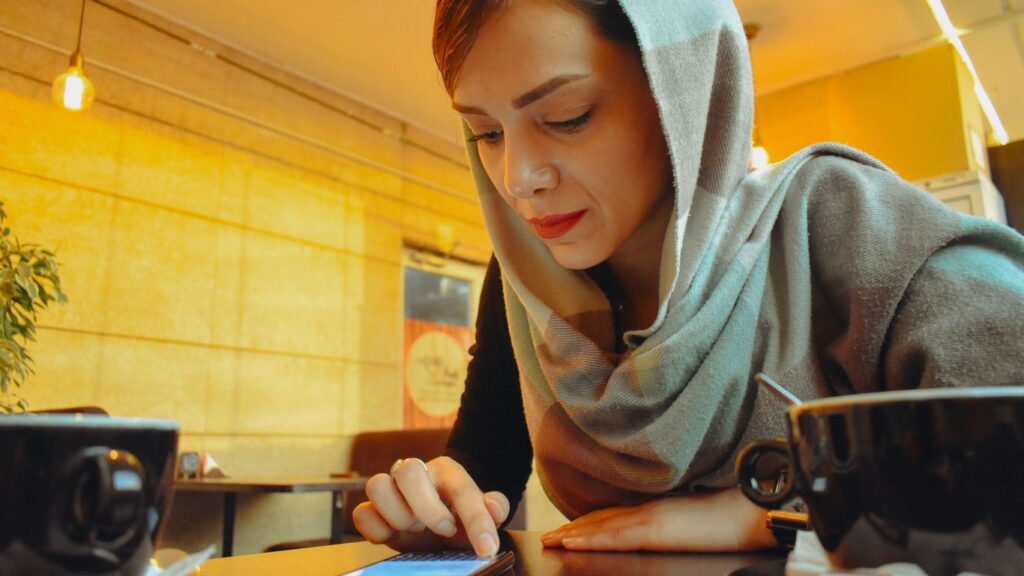 a person looking at the phone