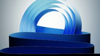 Abstract blue ribbons forming a swirling arch shape.