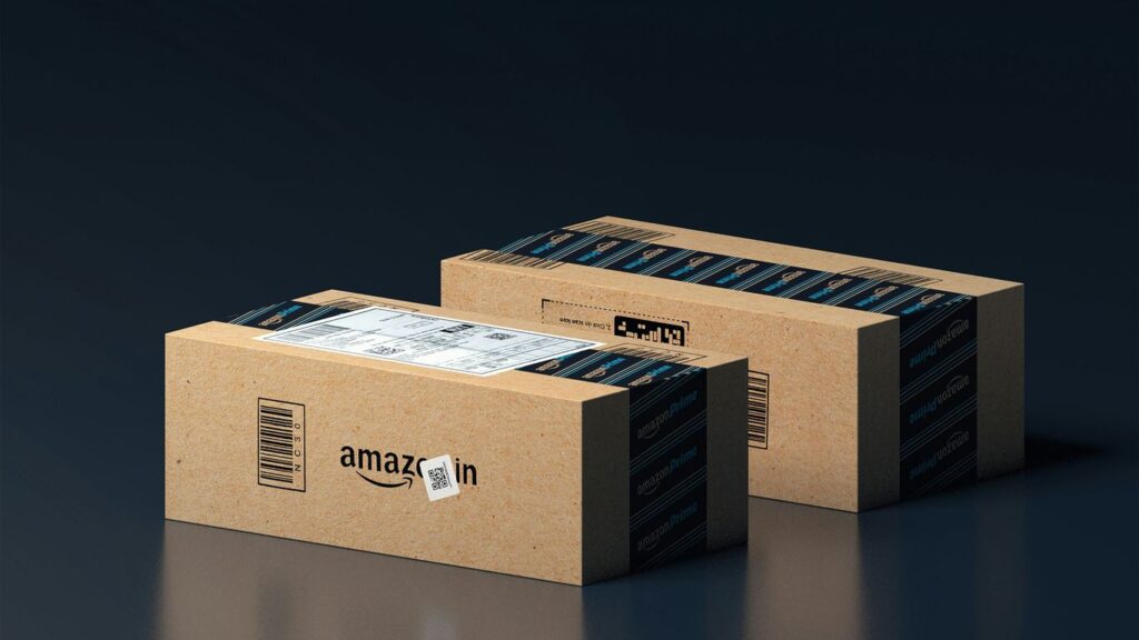 two boxes of amazon are stacked on top of each other