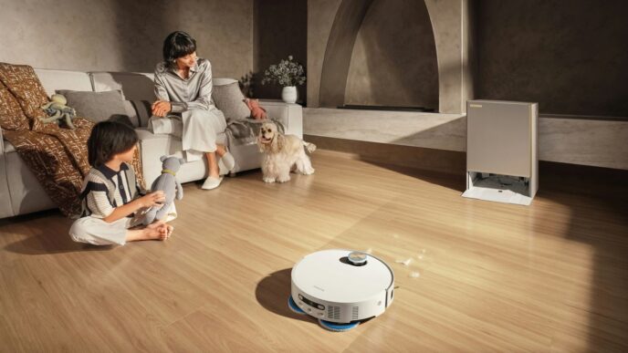 Robot vacuum cleans floor while family relaxes