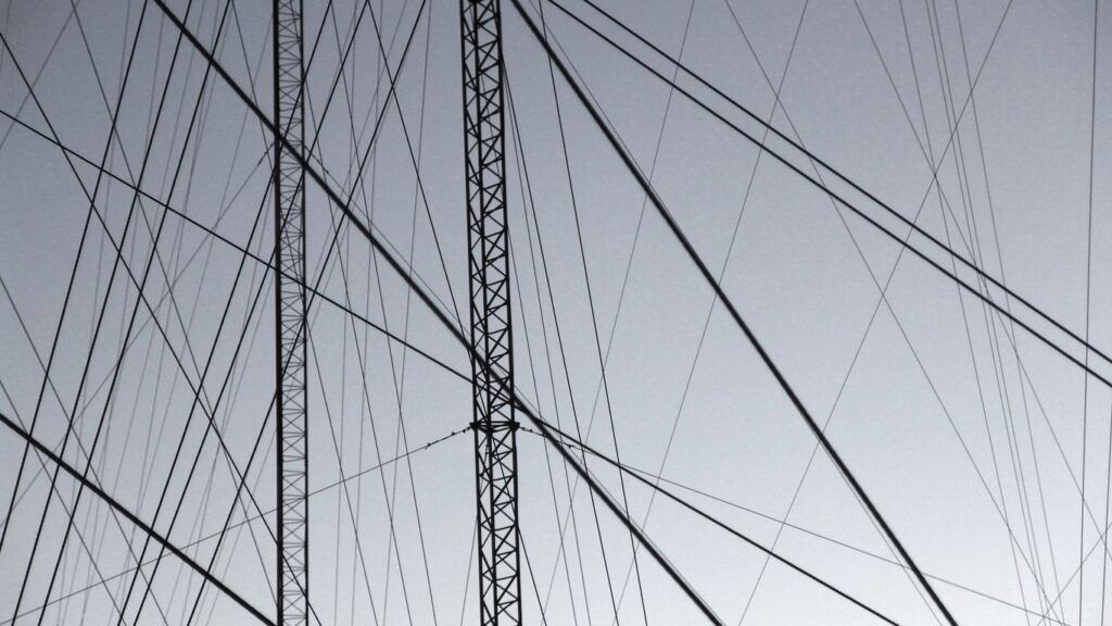 grayscale photography of gray steel structure