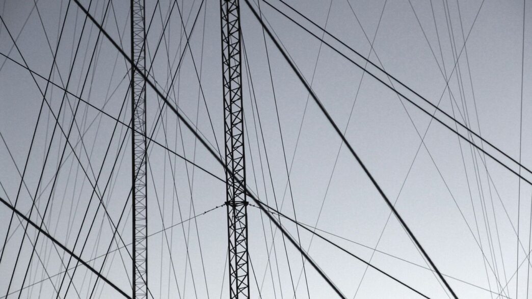 grayscale photography of gray steel structure