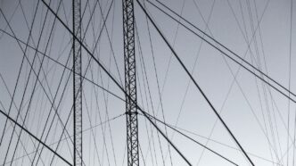 grayscale photography of gray steel structure