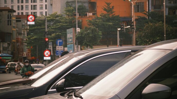 Cars and traffic on a city street.