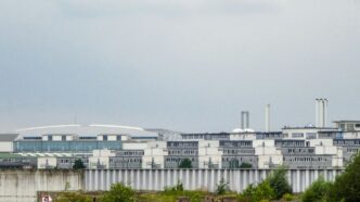 Industrial buildings under a cloudy sky