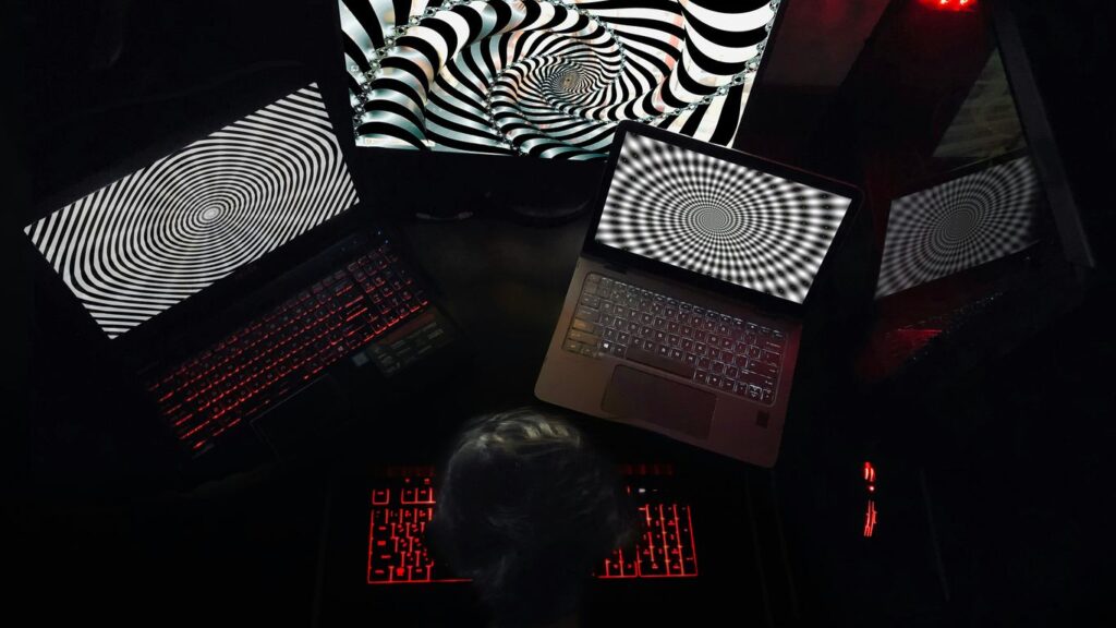 woman in white shirt sitting on chair