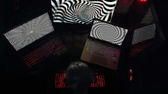 woman in white shirt sitting on chair