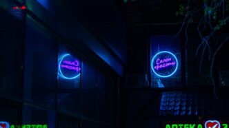 a building that has a neon sign on it