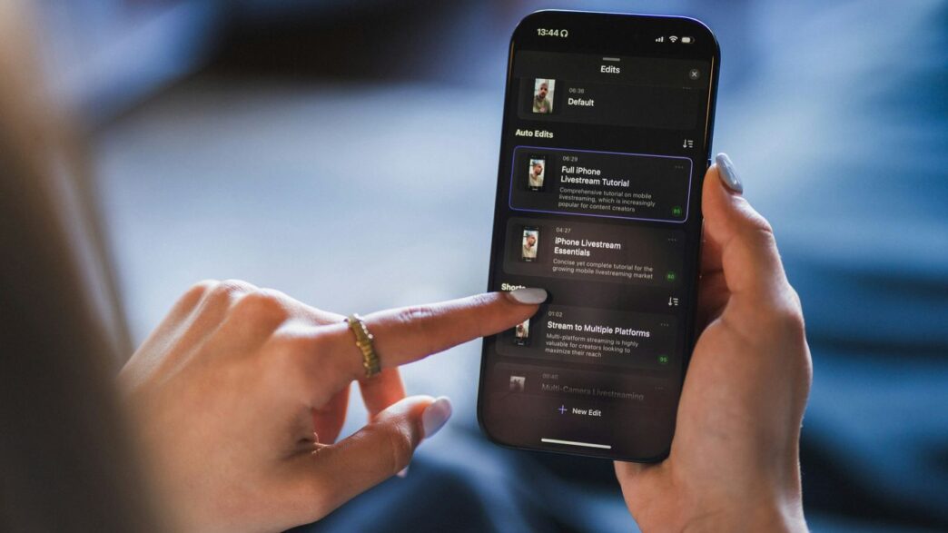 Person using a smartphone with a list on the screen
