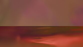 A blurry image of a red and pink background