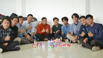 a group of men sitting next to each other