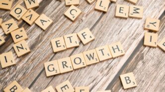 a group of scrabble tiles spelling the word growth