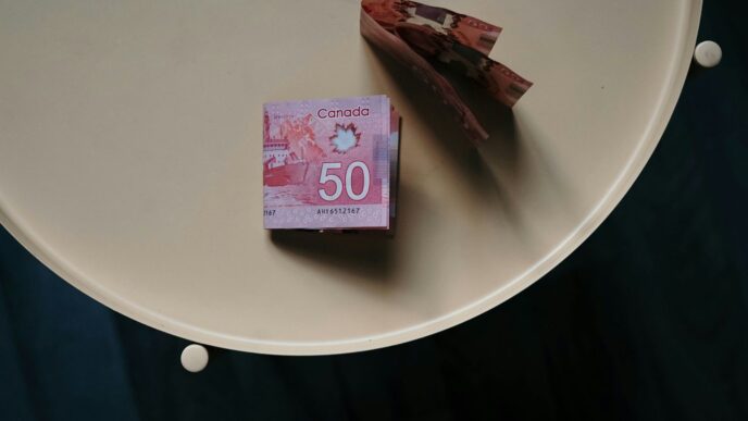 100 banknote on white round table