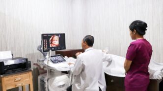 a couple of people that are in a room