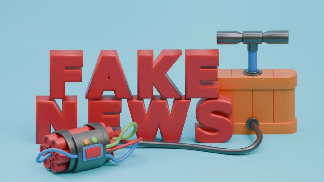 a fake news sign with a hammer and a tool