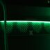 a close up of a green light in a server