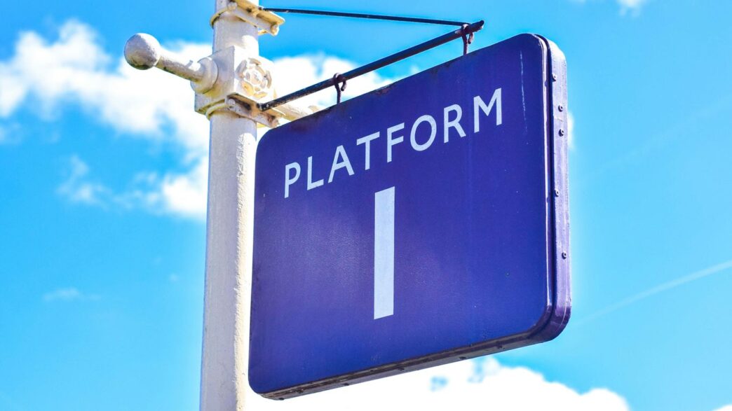 blue and white UNK street sign