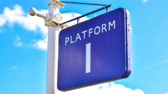 blue and white UNK street sign