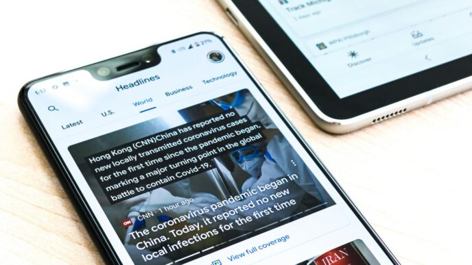 silver iphone 6 on brown wooden table