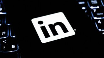 Linkedin logo on a dark keyboard