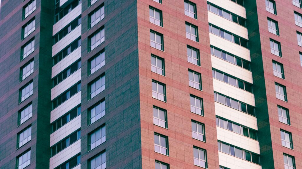 Modern brick and glass skyscraper facade detail