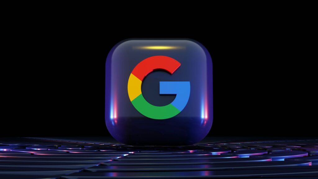 a close up of a computer keyboard with a google logo on it