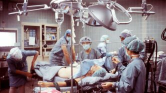 group of people wearing blue scrub suit