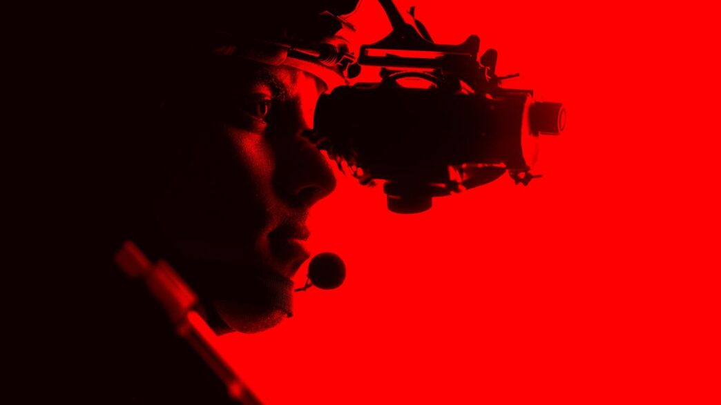 a man with a camera in his hand