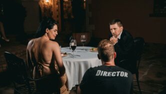 a man and a woman sitting at a table