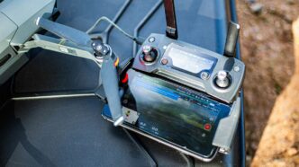 black and silver sony ps 4 game console