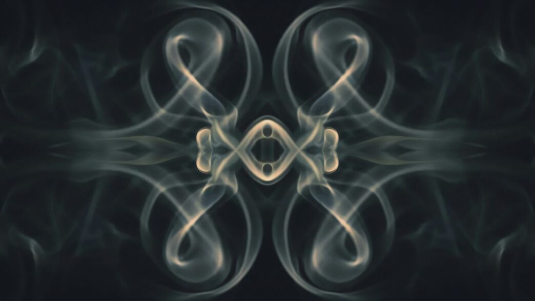 a picture of smoke with a black background