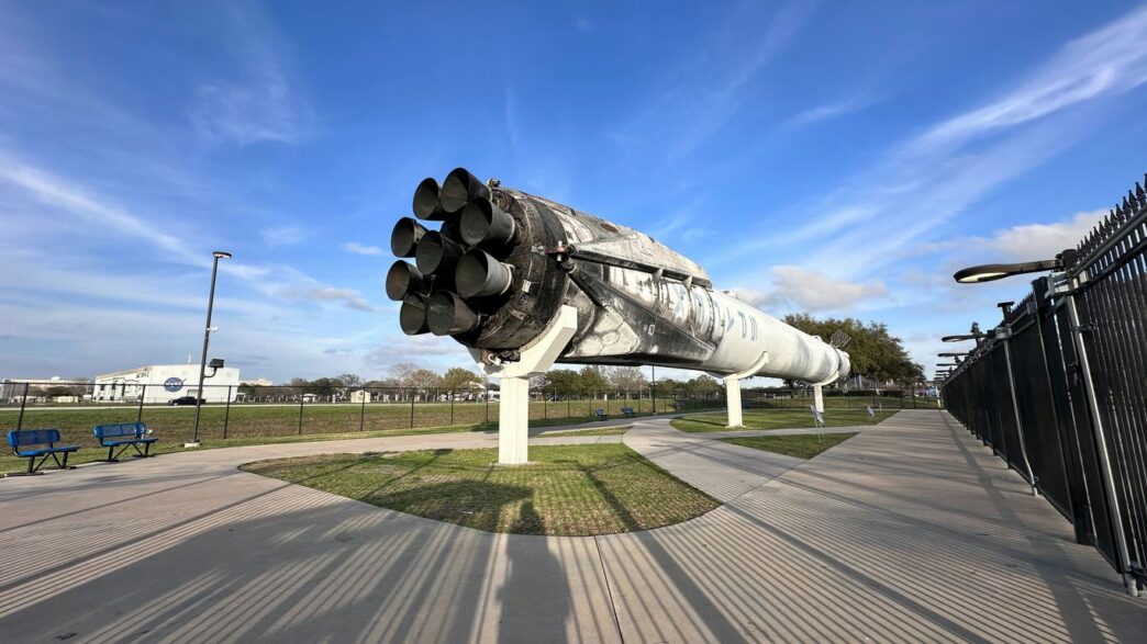 a large metal object sitting on top of a sidewalk