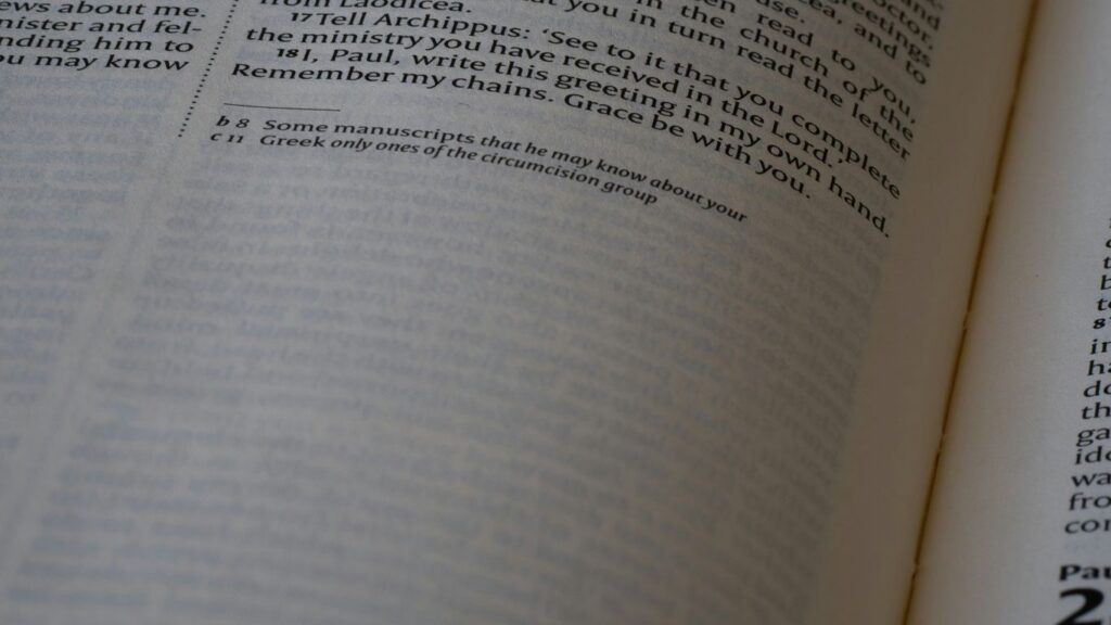 A close up of an open book with numbers on it