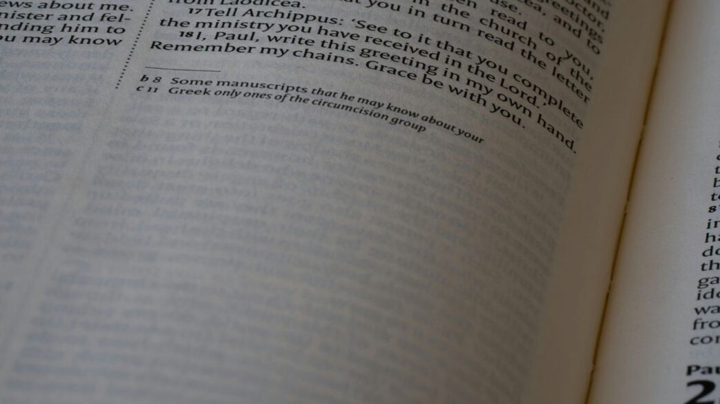 A close up of an open book with numbers on it