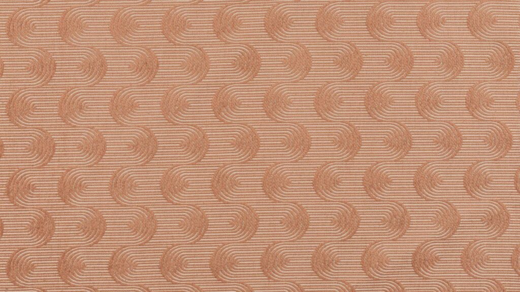 a close up of a wall with a pattern on it