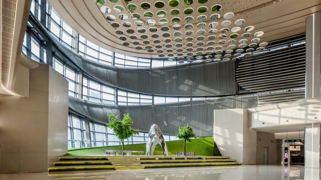 A large room with a sculpture in the middle of it