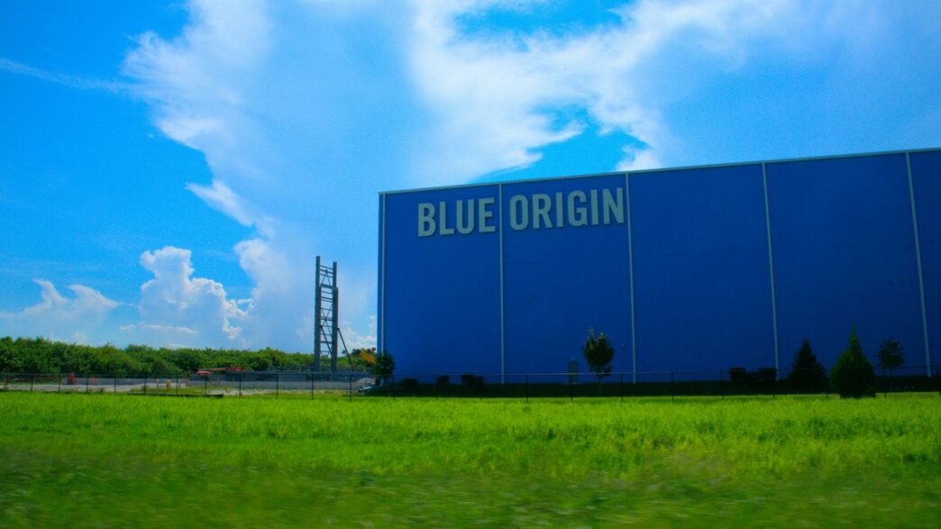 a large blue building with a sign on it